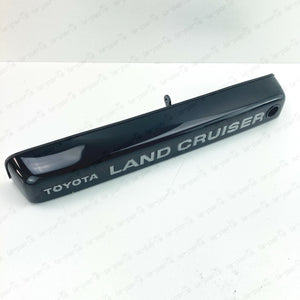 NEW GENUINE TOYOTA LAND CRUISER 80 LICENSE PLATE LAMP COVER 81276-60130