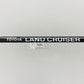 NEW GENUINE TOYOTA 91-97 LAND CRUISER FJ80 FZJ8 REAR LIFTGATE ORNAMENT