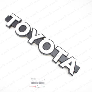 GENUINE TOYOTA 81-87 LAND CRUISER FJ60 FJ62 HJ60 FRONT GRILLE EMBLEM 75316-90A00