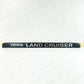 NEW GENUINE TOYOTA 91-97 LAND CRUISER FJ80 FZJ8 REAR LIFTGATE ORNAMENT