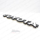 GENUINE TOYOTA 81-87 LAND CRUISER FJ60 FJ62 HJ60 FRONT GRILLE EMBLEM 75316-90A00