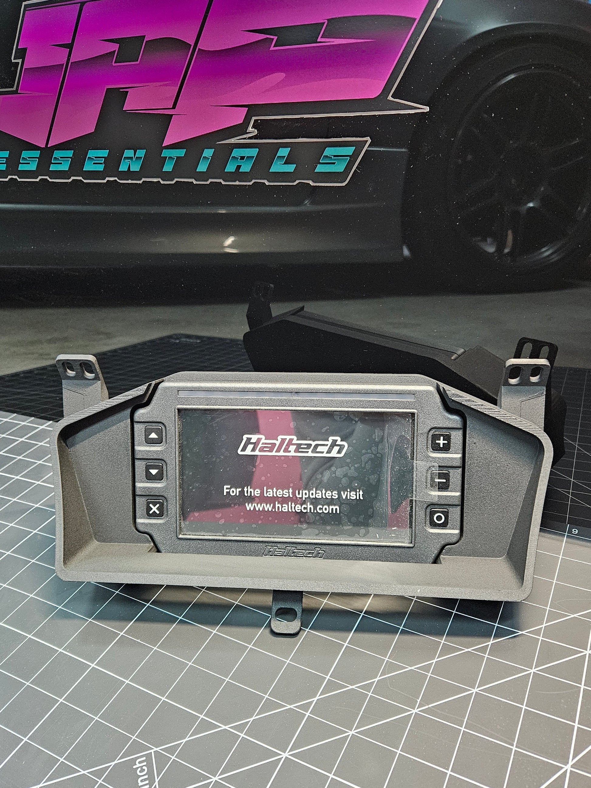 Digital Display Dash Mount to suit a Haltech iC-7 Display Screen which is a direct fit OEM factory fit which has a perfect interior black paint finish.