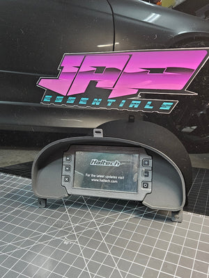 Digital Display Dash Mount to suit a Haltech iC-7 Display Screen which is a direct fit OEM factory fit which has a perfect interior black paint finish.