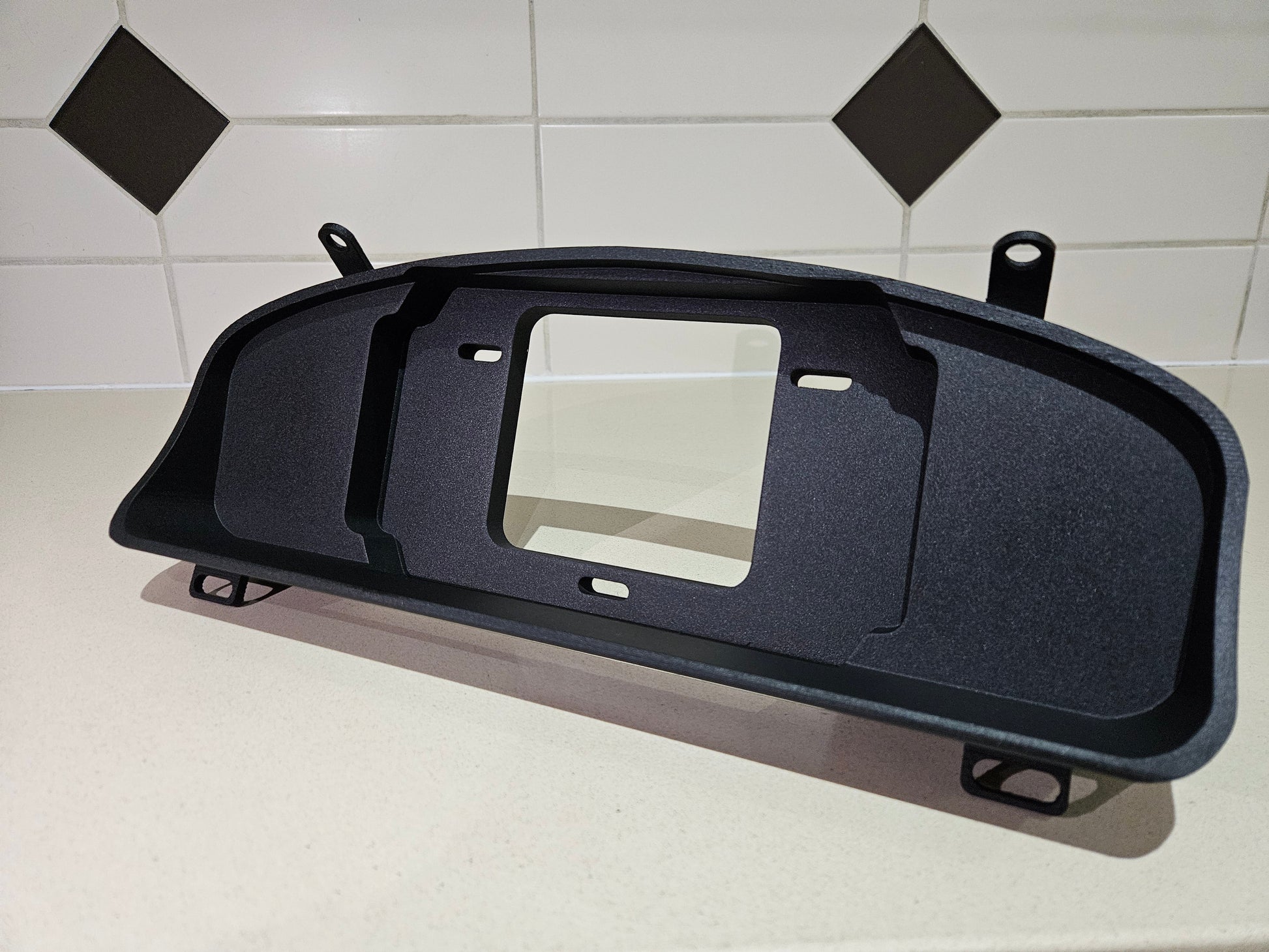 Digital Display Dash Mount to suit a Haltech iC-7 Display Screen which is a direct fit OEM factory fit which has a perfect interior black paint finish.