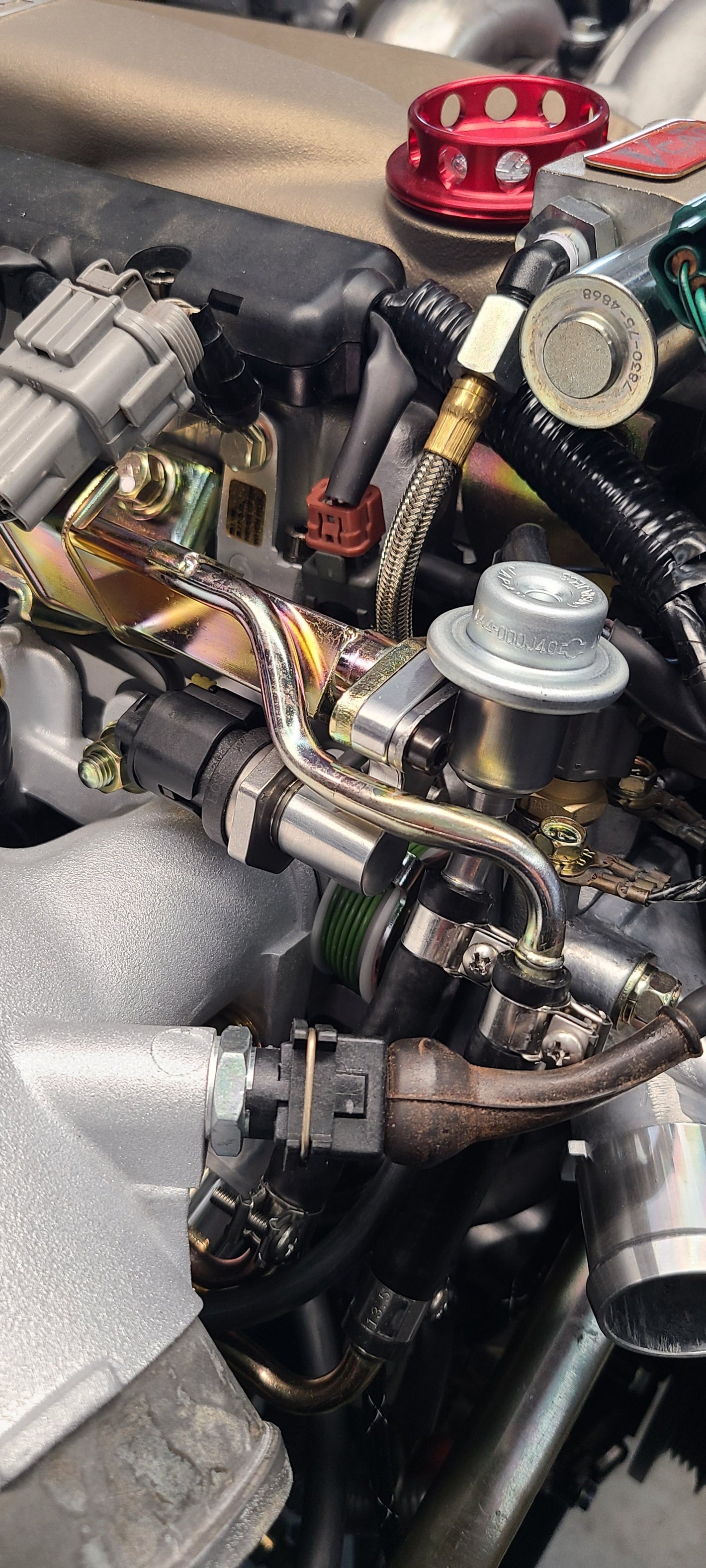 U.P.G RB26 fuel pressure adapter to OEM rail